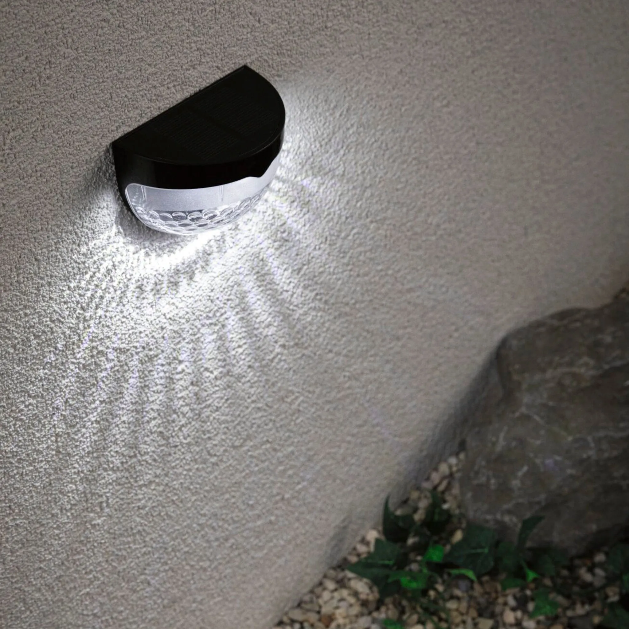 Outdoor Mimmo 1.2W LED Solar Pathway Wall Light in Black